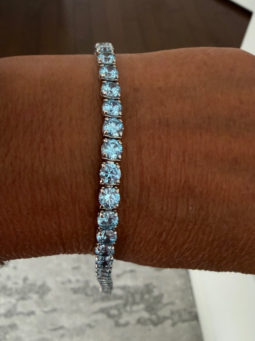 Swarovski Matrix Tennis bracelet, with round blue crystals and rhodium plating.